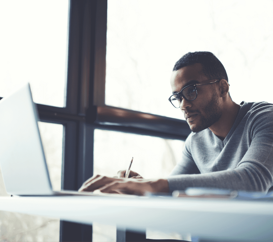 Man Studying with Computer